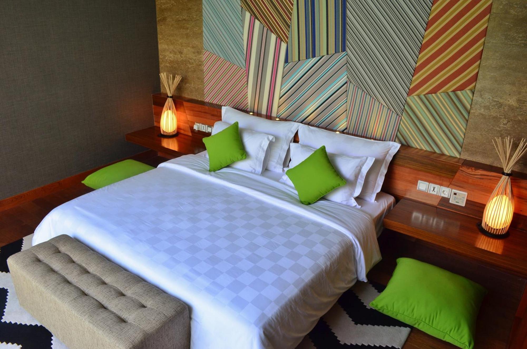 ホテル Ts スイーツ スミニャック バリ 部屋 写真 A bedroom at the hotel